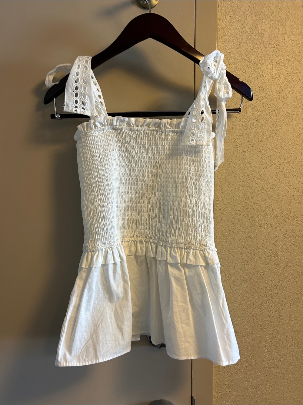 Vine & Love White Smocked Eyelet Tie-Shoulder Peplum Top
